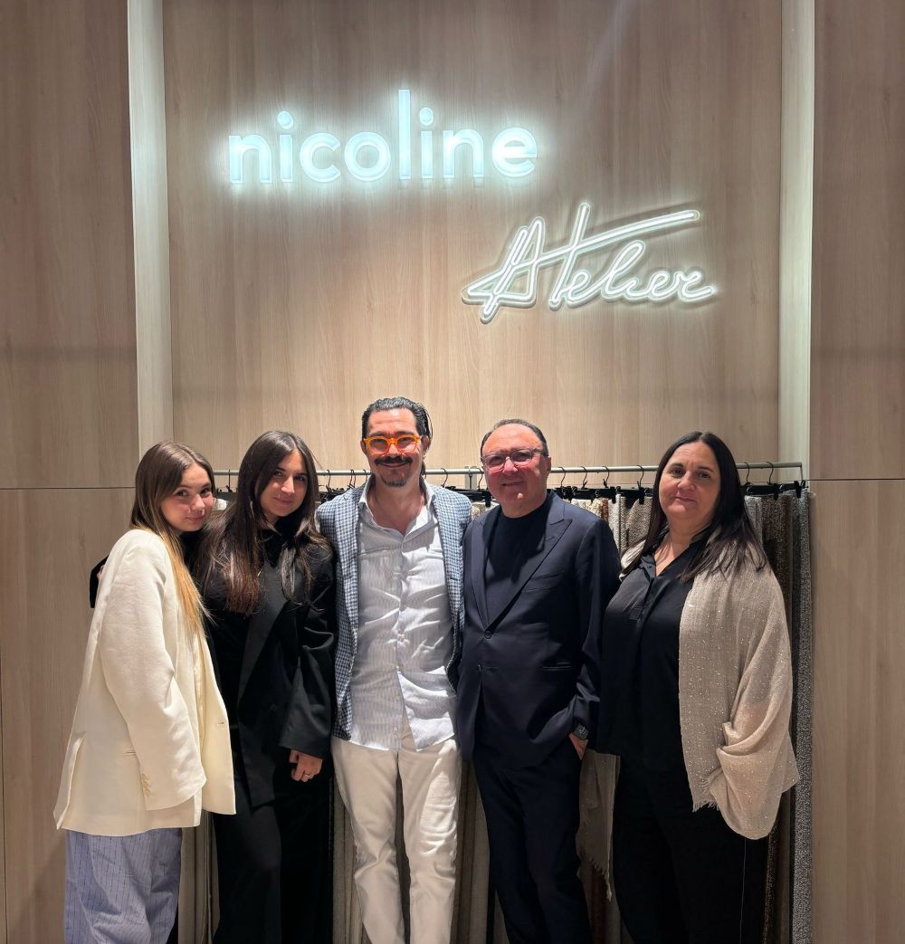 A group photo in front of Nicoline's setup at Milan Design Week