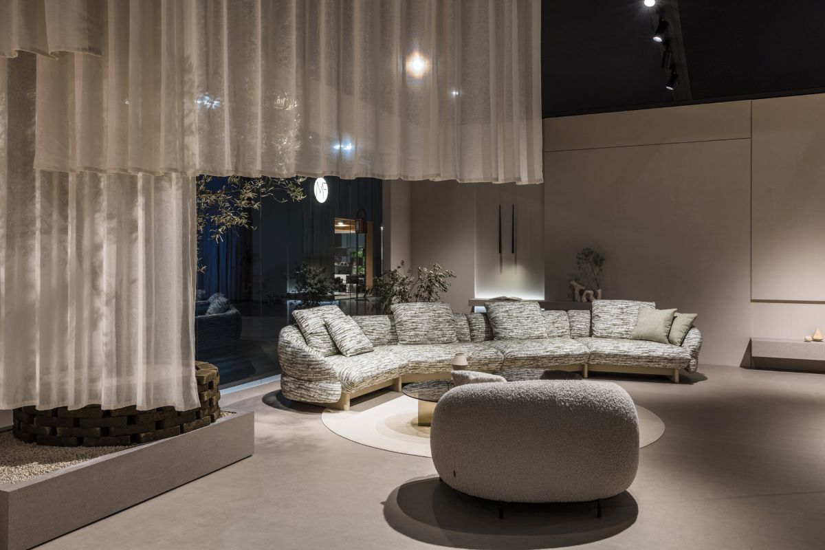 A green Nicoline sofa setup at Milan Design Week 2025