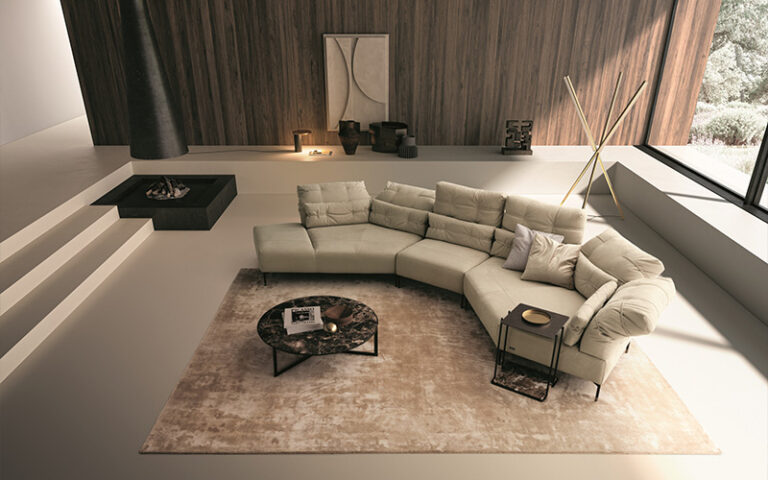 A luxurious modern living room featuring a large Italian sectional sofa