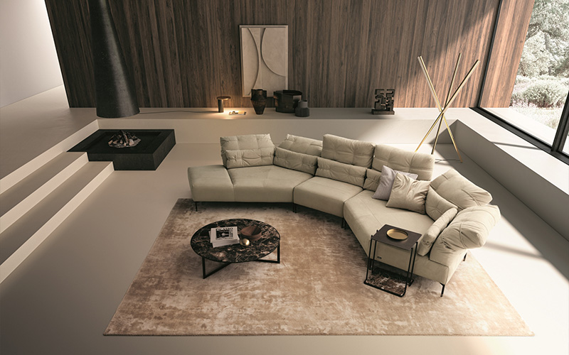 A luxurious modern living room featuring a large Italian sectional sofa