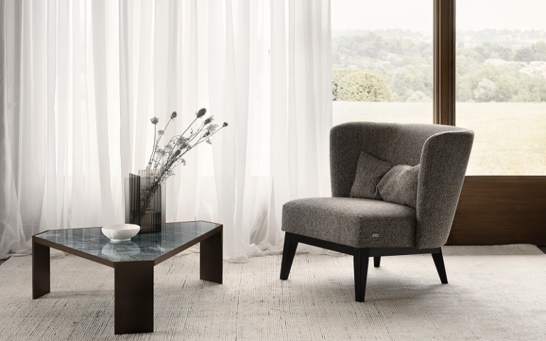 Modern Colzani armchair styled in a minimalist living room.